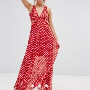 Red and white polka dot maxi dress with side cutouts